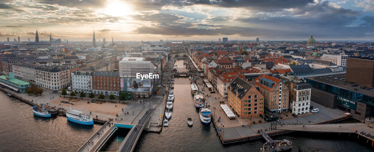 Famous nyhavn pier with colorful buildings and boats in copenhagen, denmark.