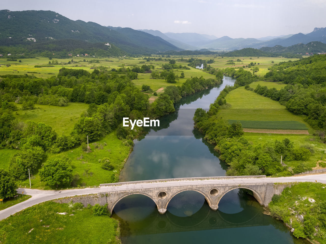 Aerial view of the old stone bridge on the lika river, croatia