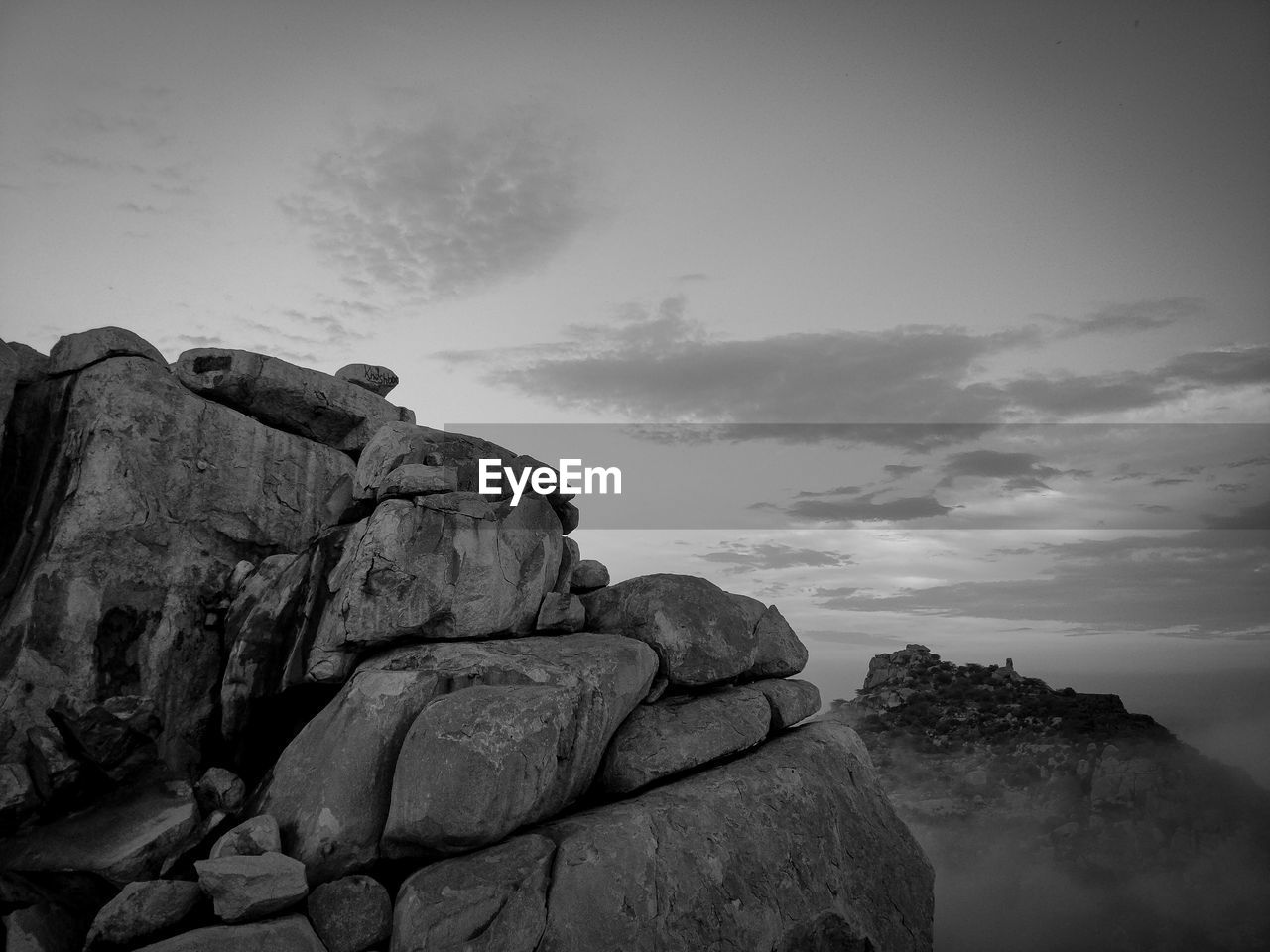 LOW ANGLE VIEW OF ROCK STATUE AGAINST SKY