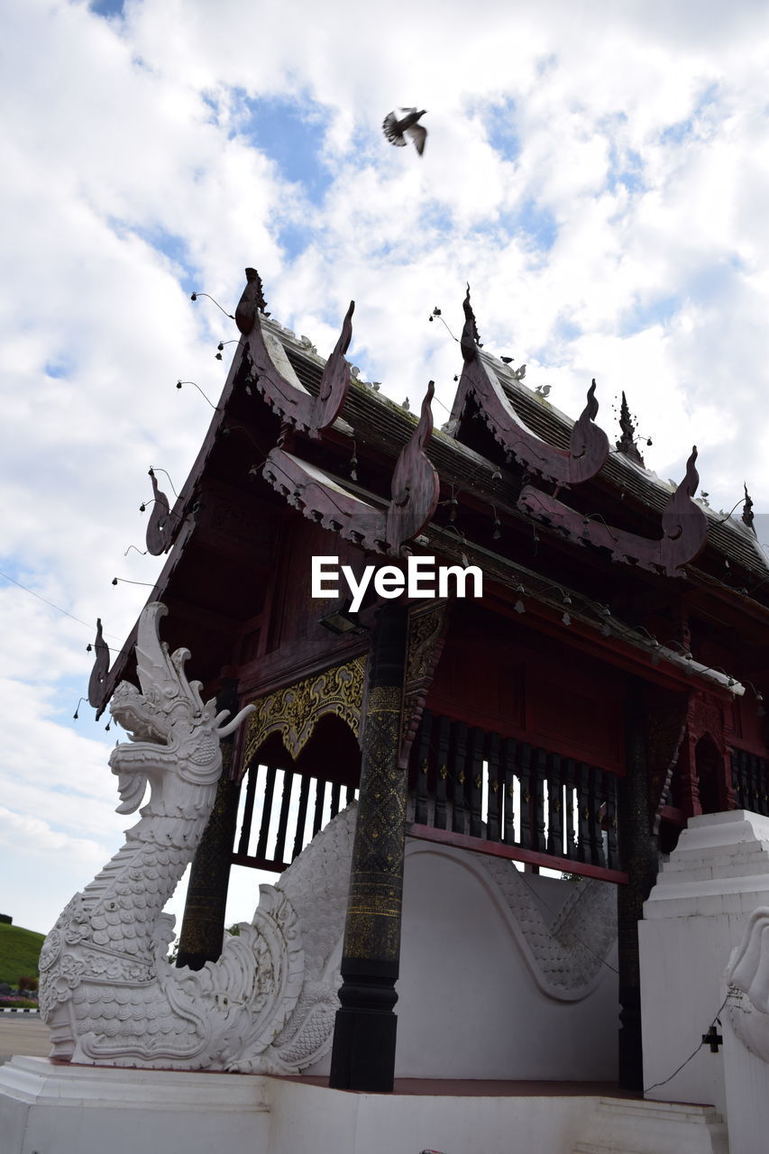 TRADITIONAL BUILDING AGAINST SKY