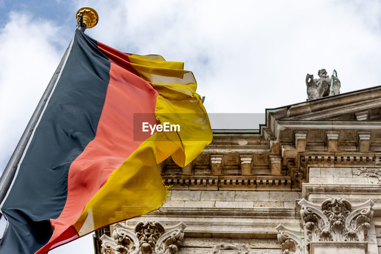 German flag waving against building in munich