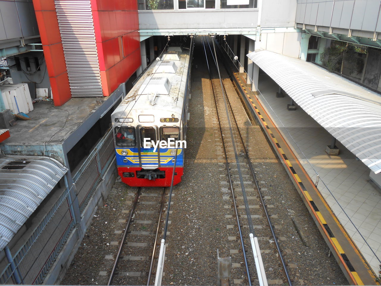 HIGH ANGLE VIEW OF RAILROAD STATION PLATFORM
