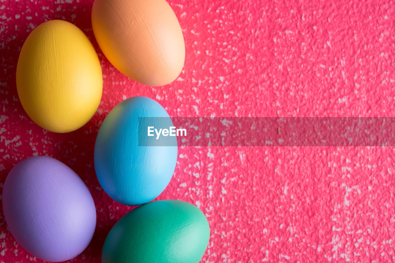 Directly above shot of colorful easter eggs on table