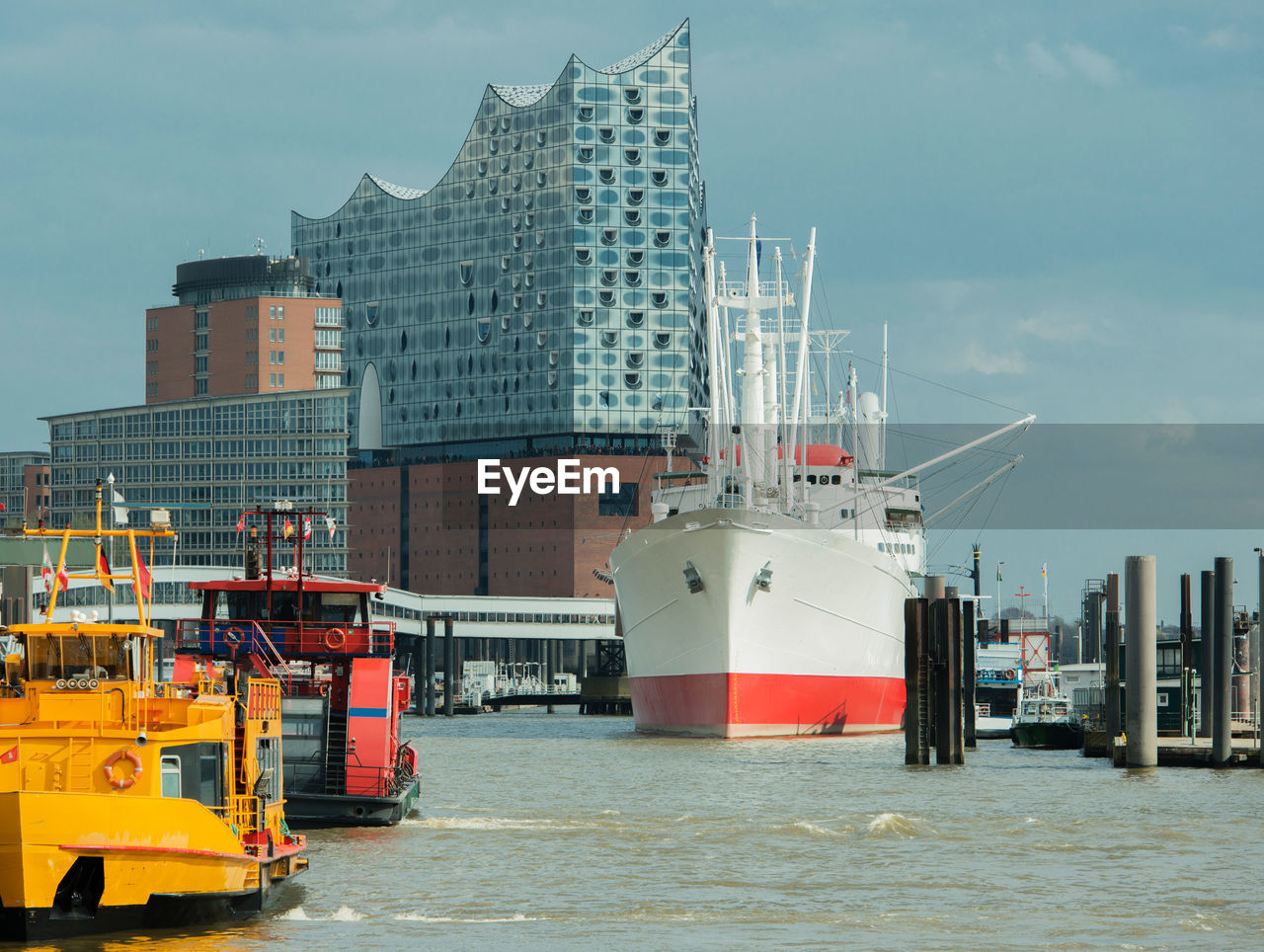 COMMERCIAL DOCK AGAINST SKY IN CITY