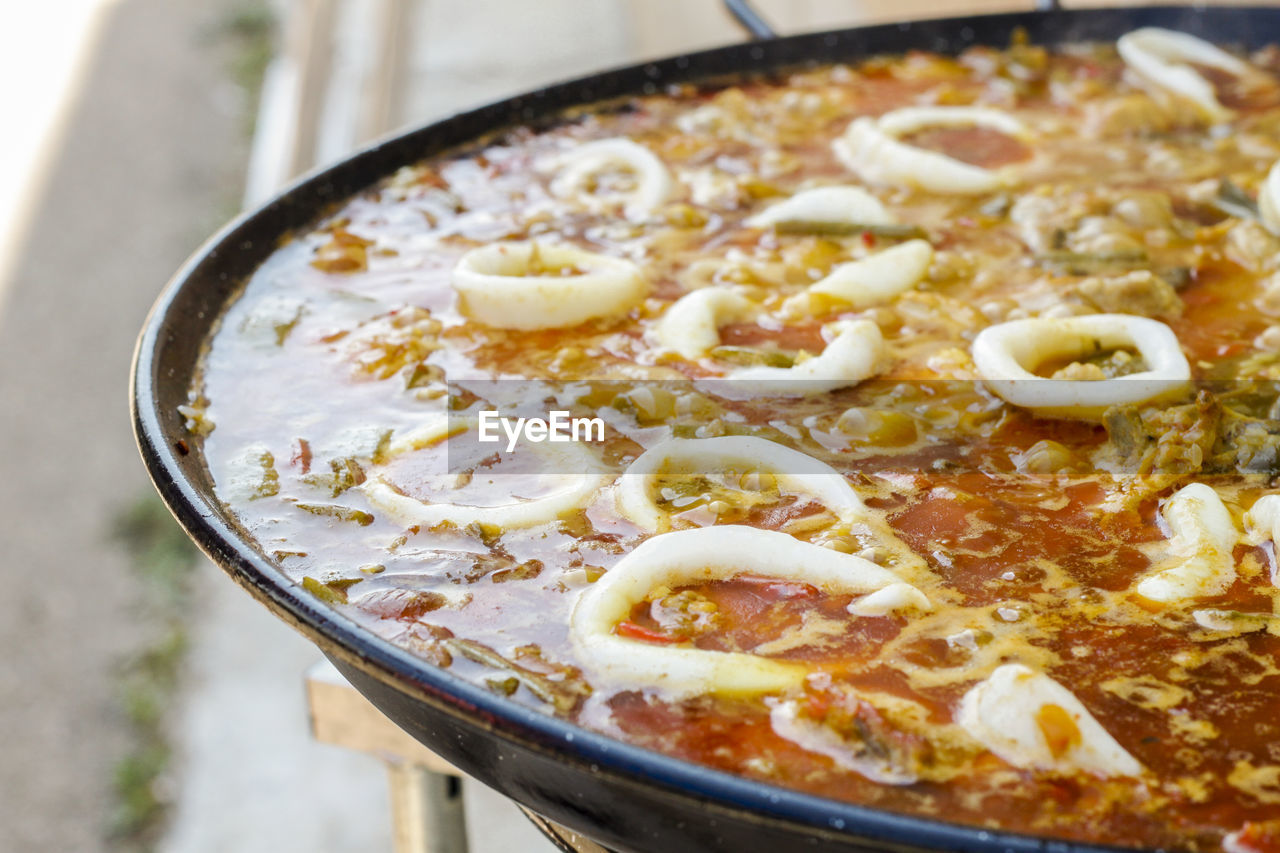Cooking typical spanish seafood paella