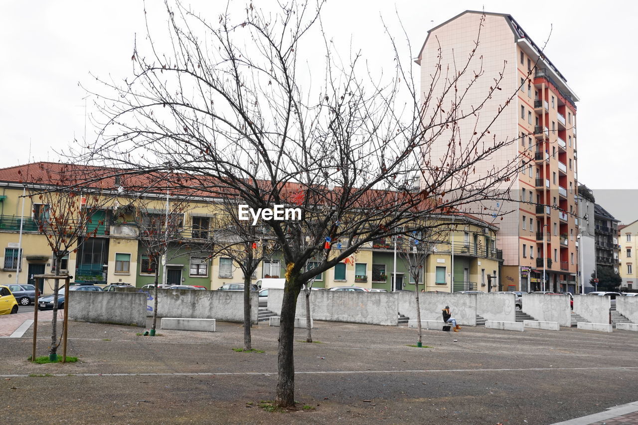 BUILDINGS IN CITY AGAINST SKY