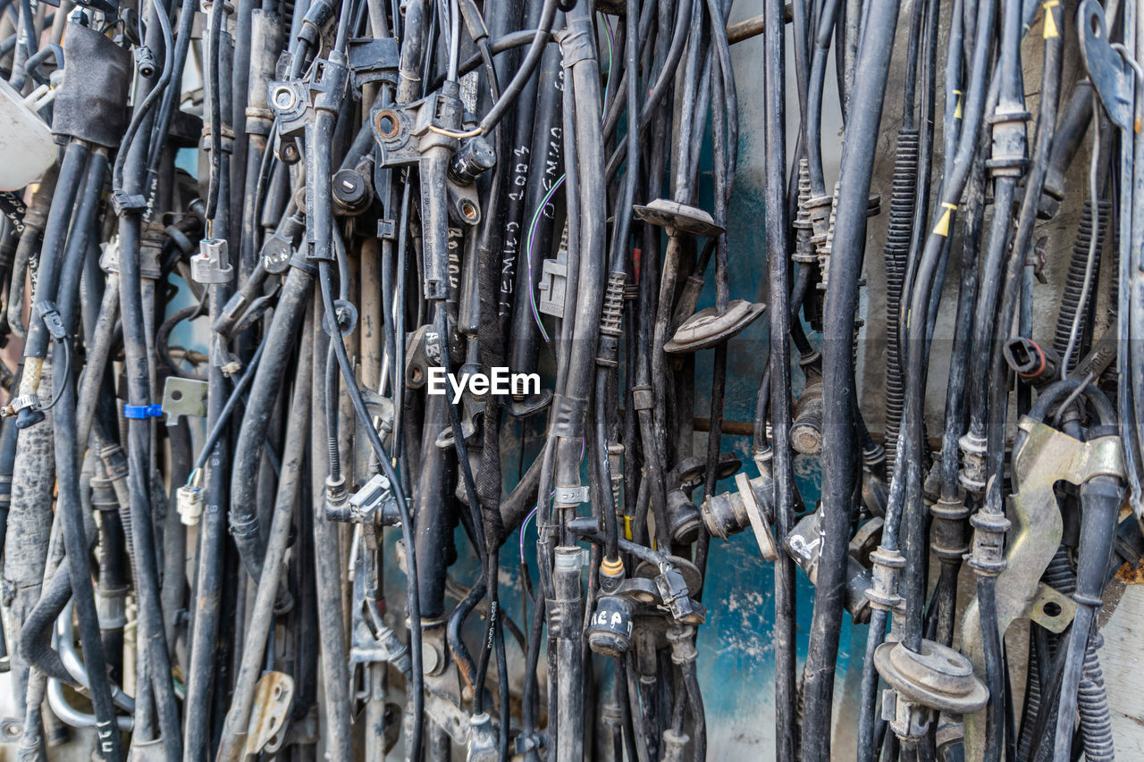 full frame, no people, iron, large group of objects, backgrounds, ice, abundance, day, scrap, winter, outdoors, fishing, hanging, fishing industry, metal, close-up