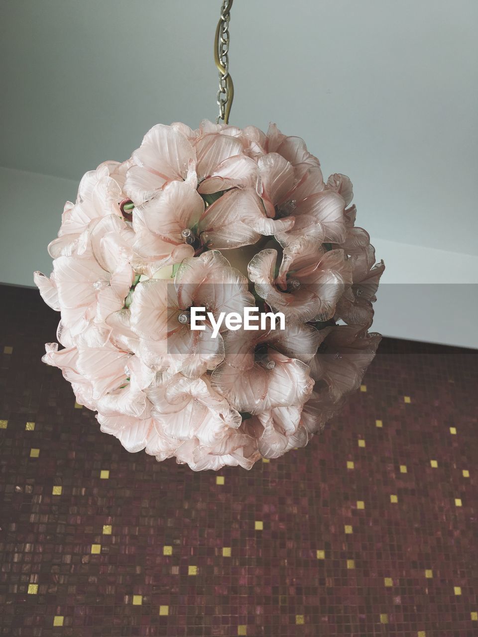 CLOSE-UP OF WILTED PINK FLOWER HANGING ON CEILING