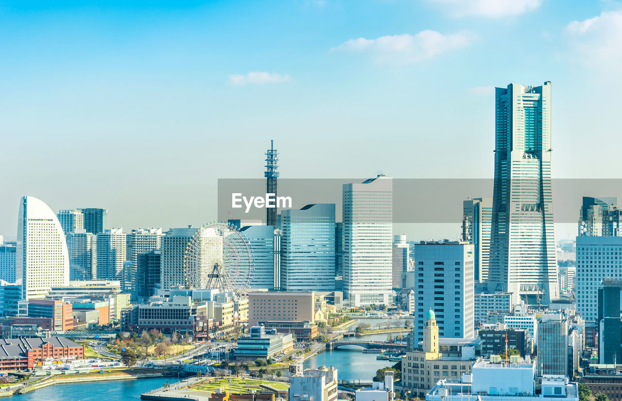 Aerial view of cityscape against sky