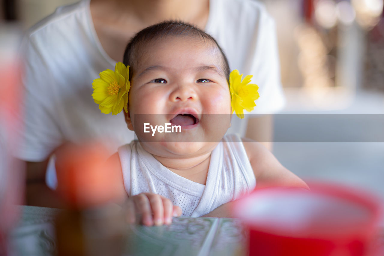 Portrait of cute baby at home