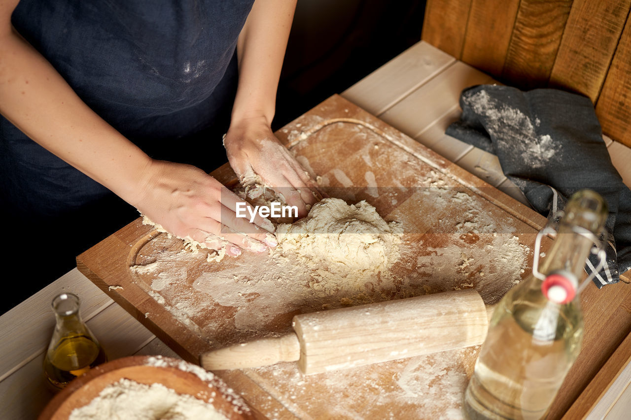 Midsection of woman preparing food