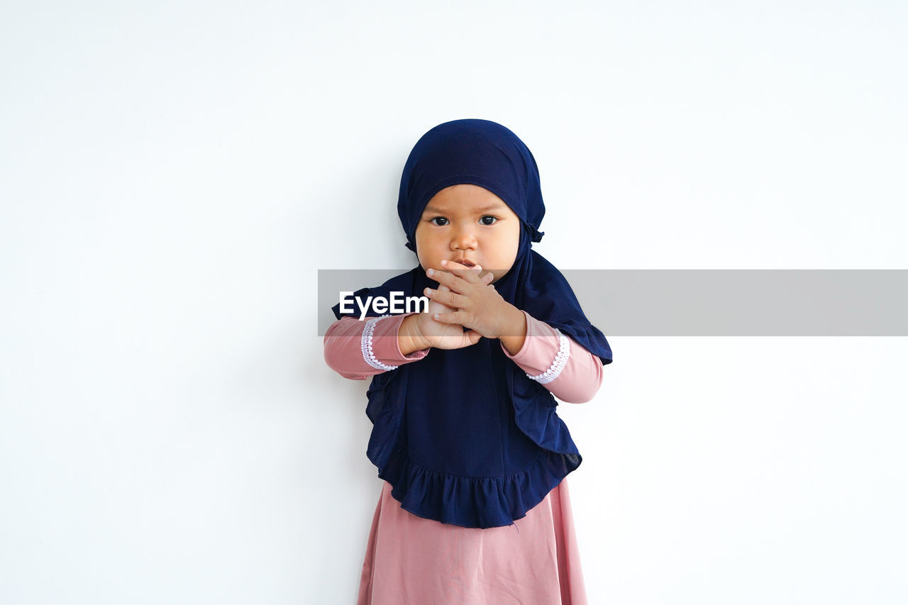 one person, childhood, child, white background, studio shot, adult, indoors, portrait, toddler, cut out, clothing, looking at camera, baby, waist up, front view, copy space, standing, cartoon, cute, female, women, lifestyles, emotion