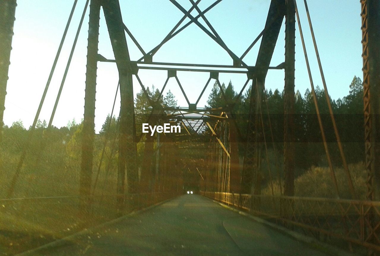 Bridge seen through car windshield