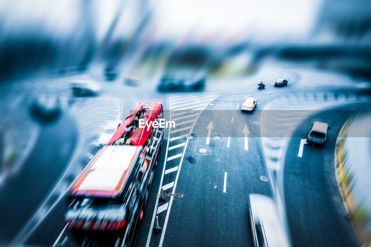 BLURRED MOTION OF TRAFFIC ON ROAD