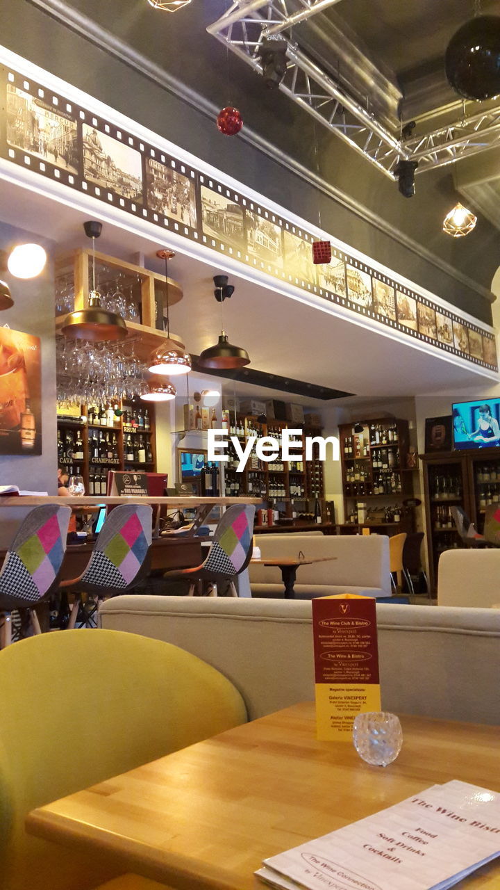 CHAIRS AND TABLES AT RESTAURANT