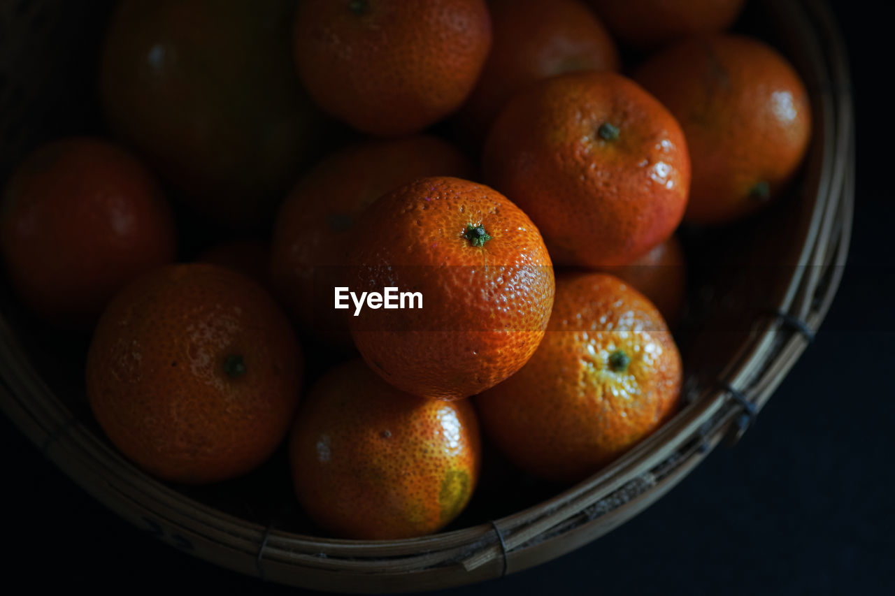High angle view of orange in basket