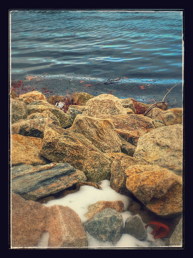 VIEW OF ROCKS IN WATER