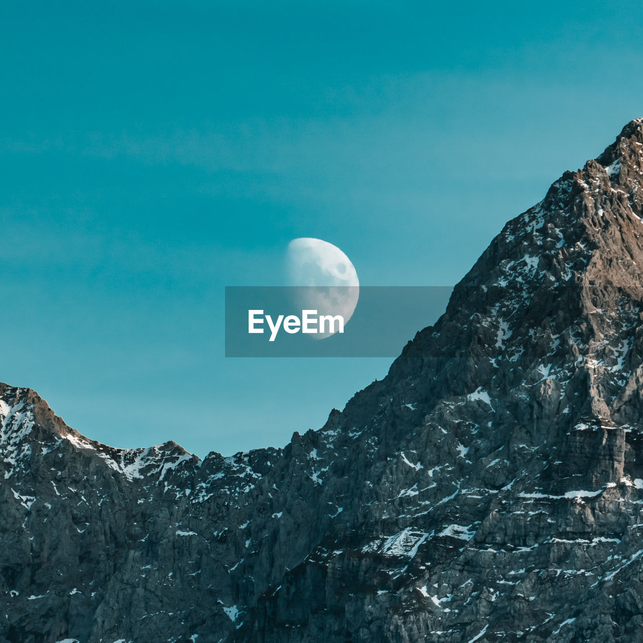 moon, sky, scenics - nature, beauty in nature, mountain, space, astronomy, nature, tranquility, environment, tranquil scene, landscape, full moon, night, mountain range, no people, blue, outdoors, cold temperature, snow, winter, idyllic, clear sky, rock, land, exploration, non-urban scene, cloud, mountain peak, dusk