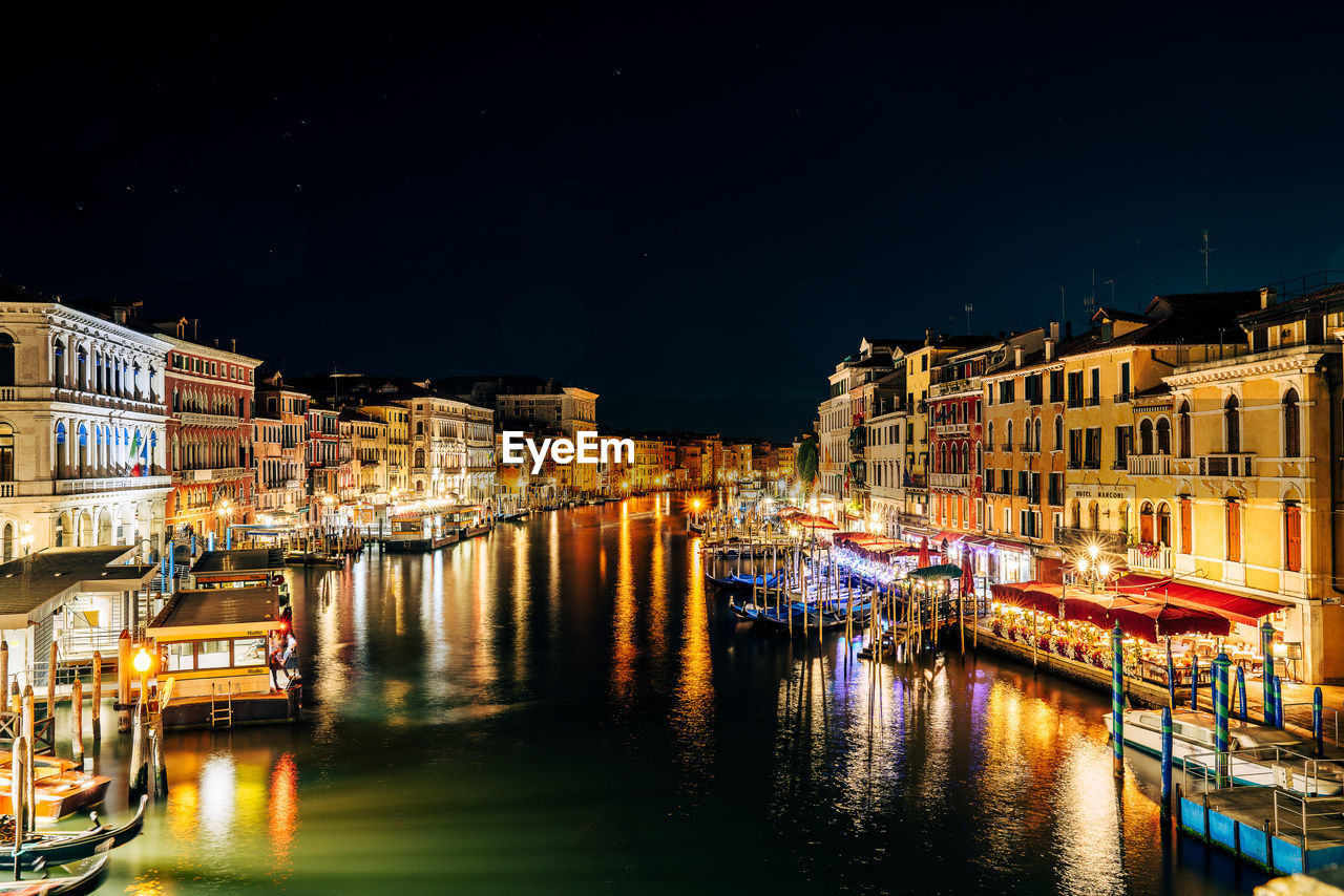 View from ponte di rialto onto canal grande at night