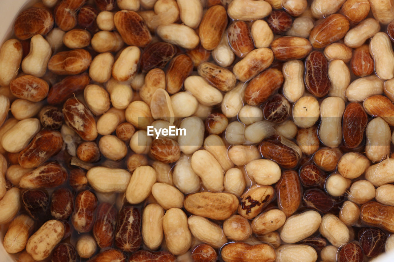 Full frame shot of peanuts in water