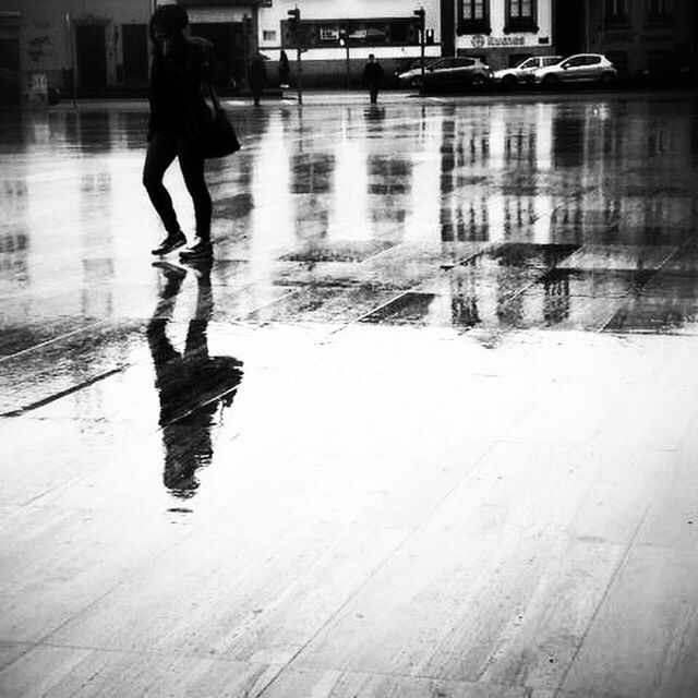 WOMAN WALKING IN WATER