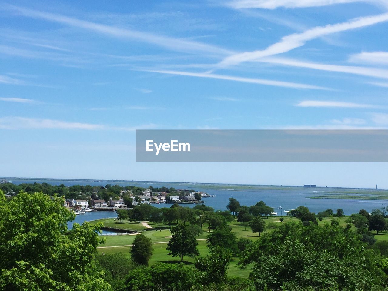 Scenic view of sea against blue sky