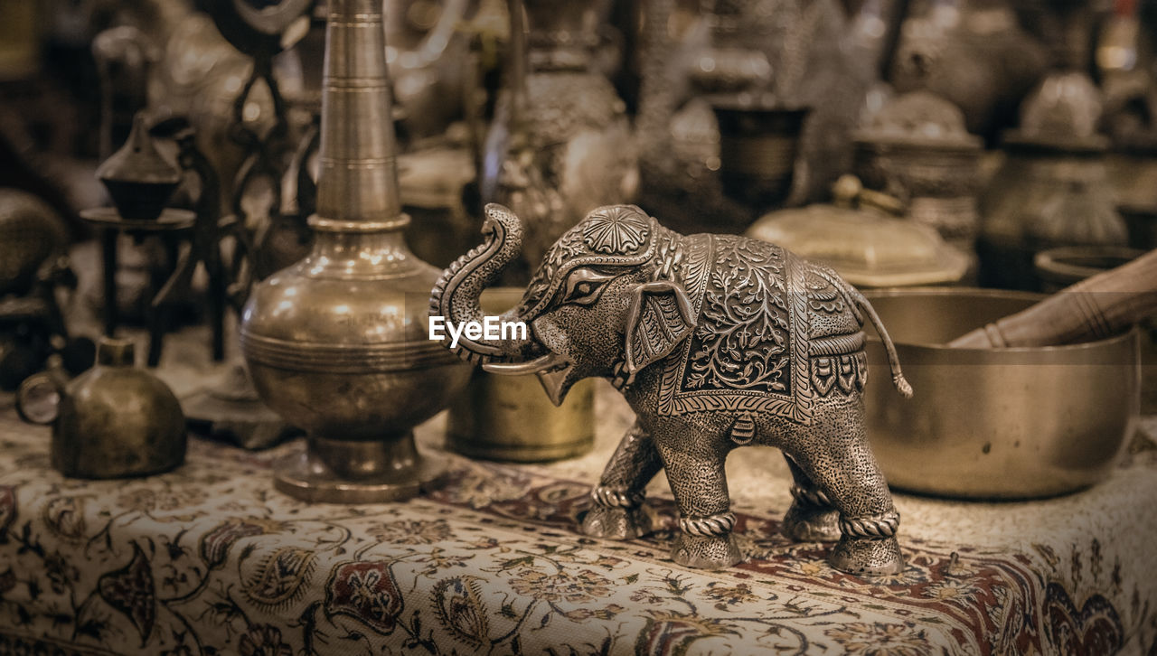 Detailed close-up elephant figurine made of metal. copper utensils. jordanian souvenir shop.