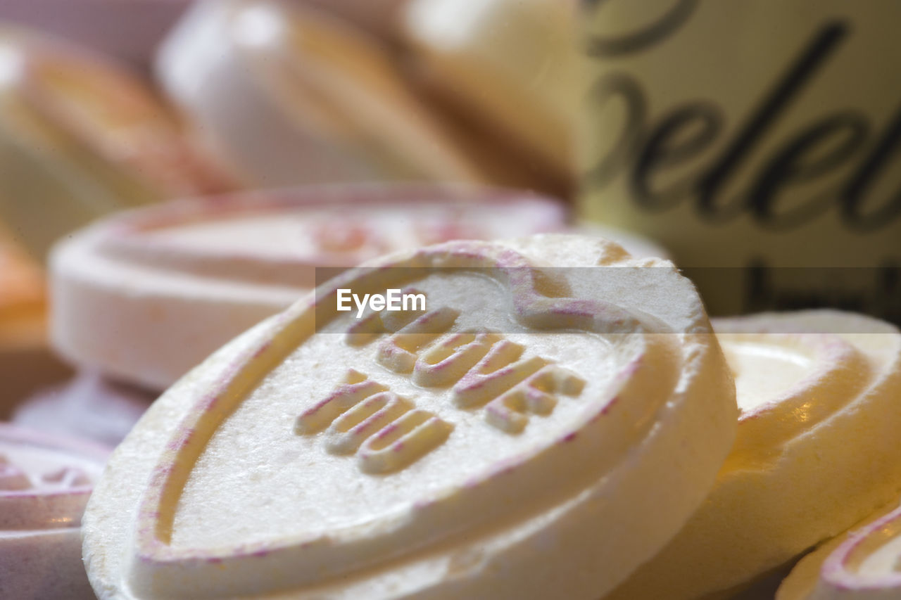 Close-up of text on sweet food with heart shape
