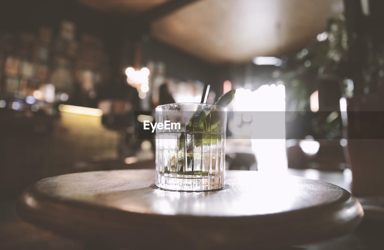 CLOSE-UP OF WINE ON TABLE