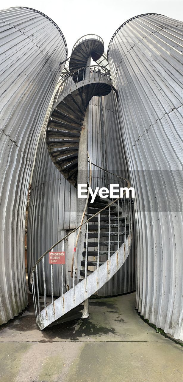 LOW ANGLE VIEW OF BRIDGE IN FACTORY