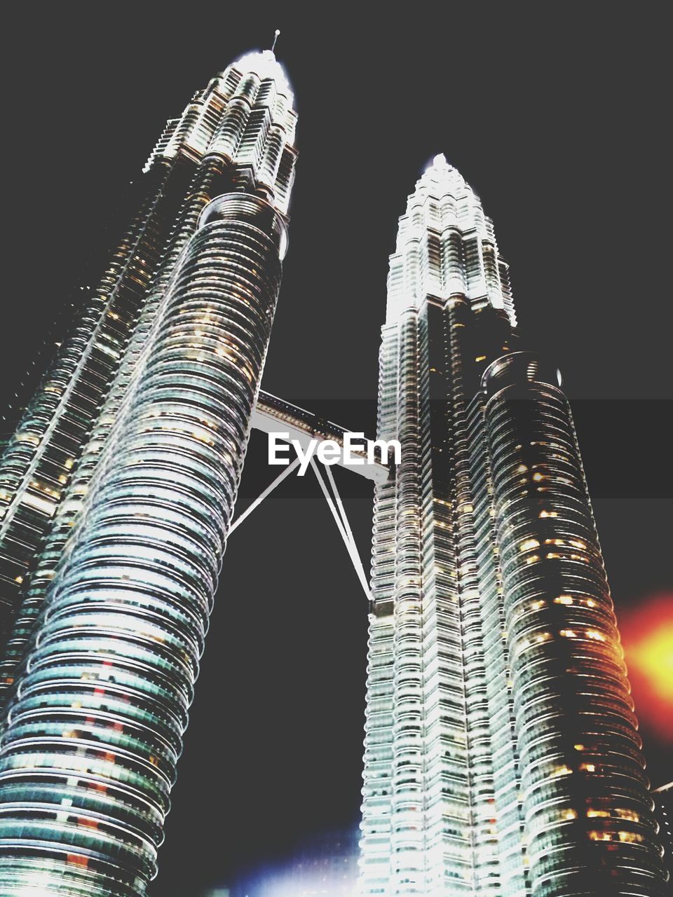 Low angle view of petronas towers against sky