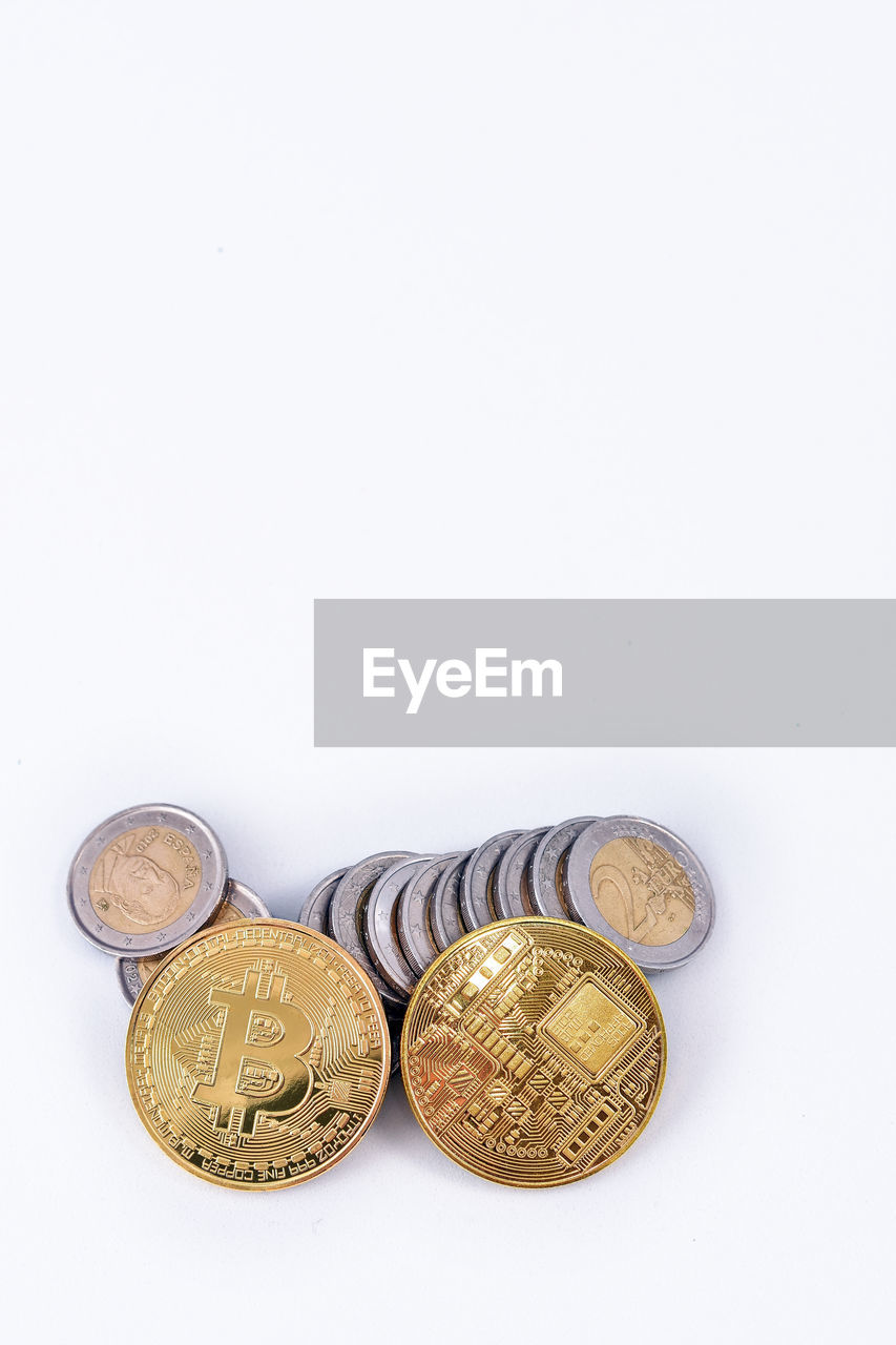 HIGH ANGLE VIEW OF COINS