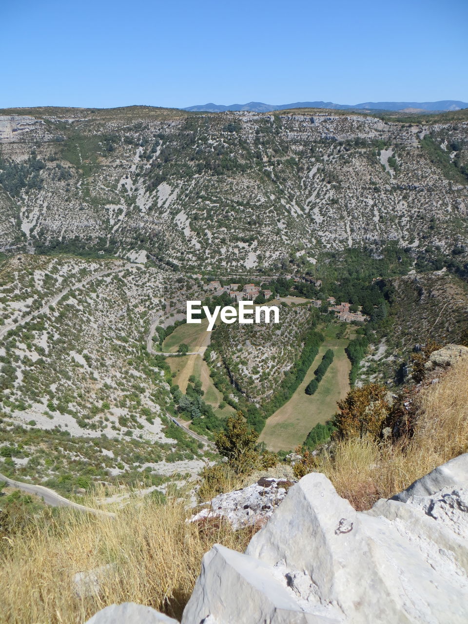 Scenic view of rocky mountains against clear sky