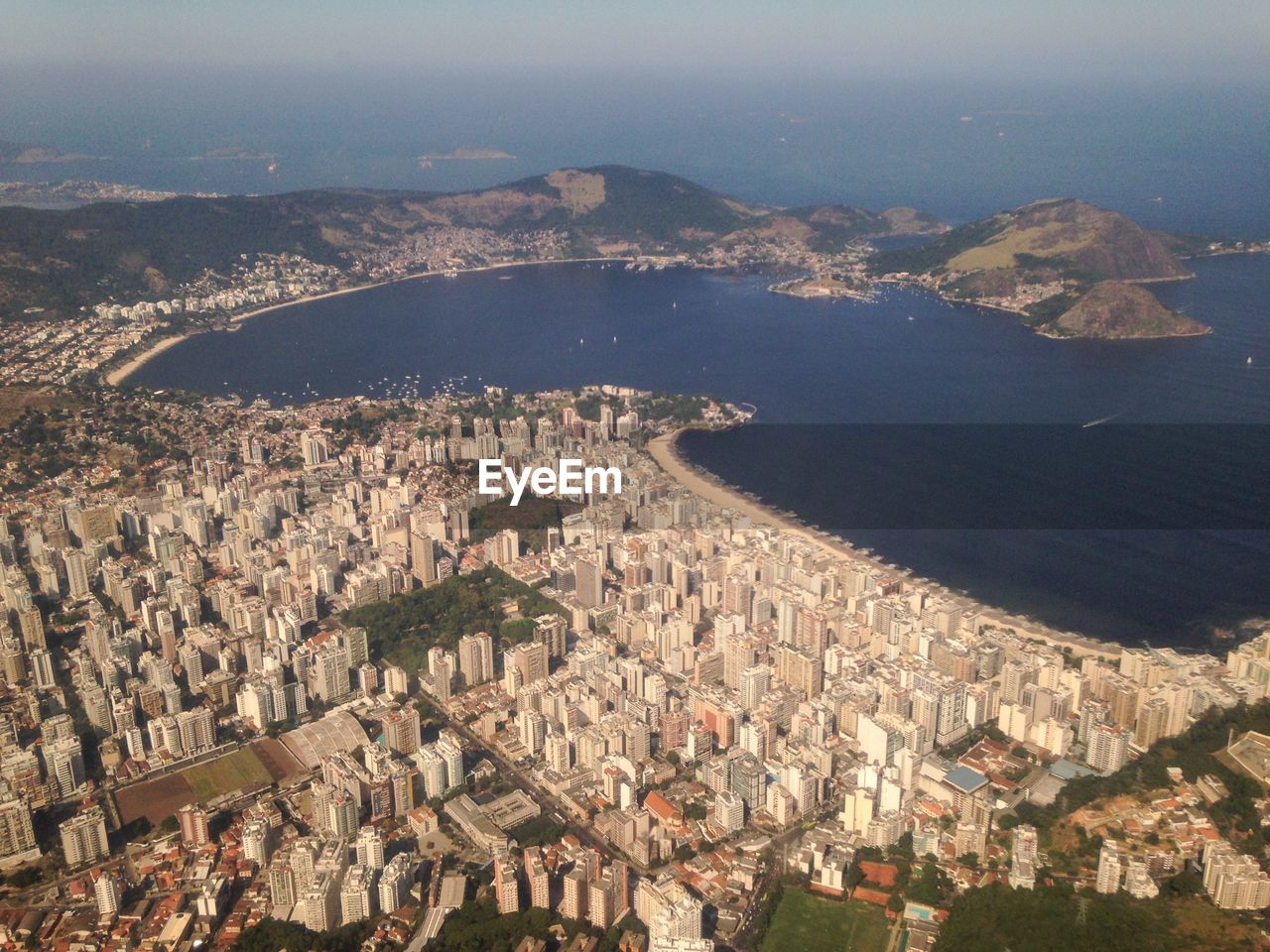 Aerial view of cityscape and sea