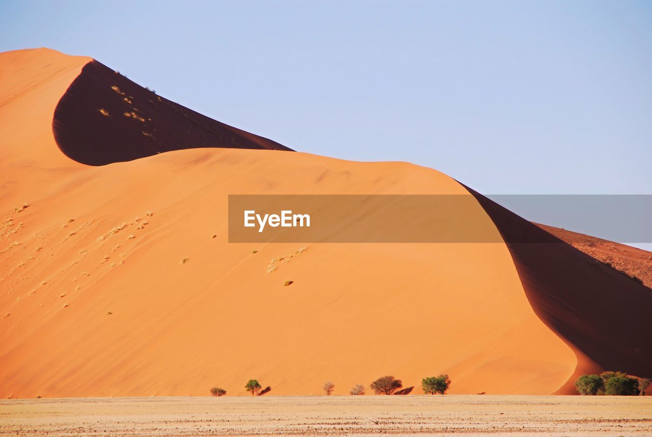 Scenic view of namib desert against clear sky