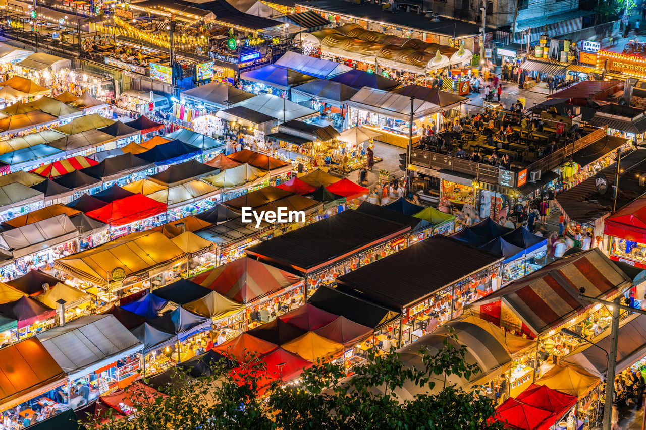 Bangkok city business downtown and train night market ratchada, thailand