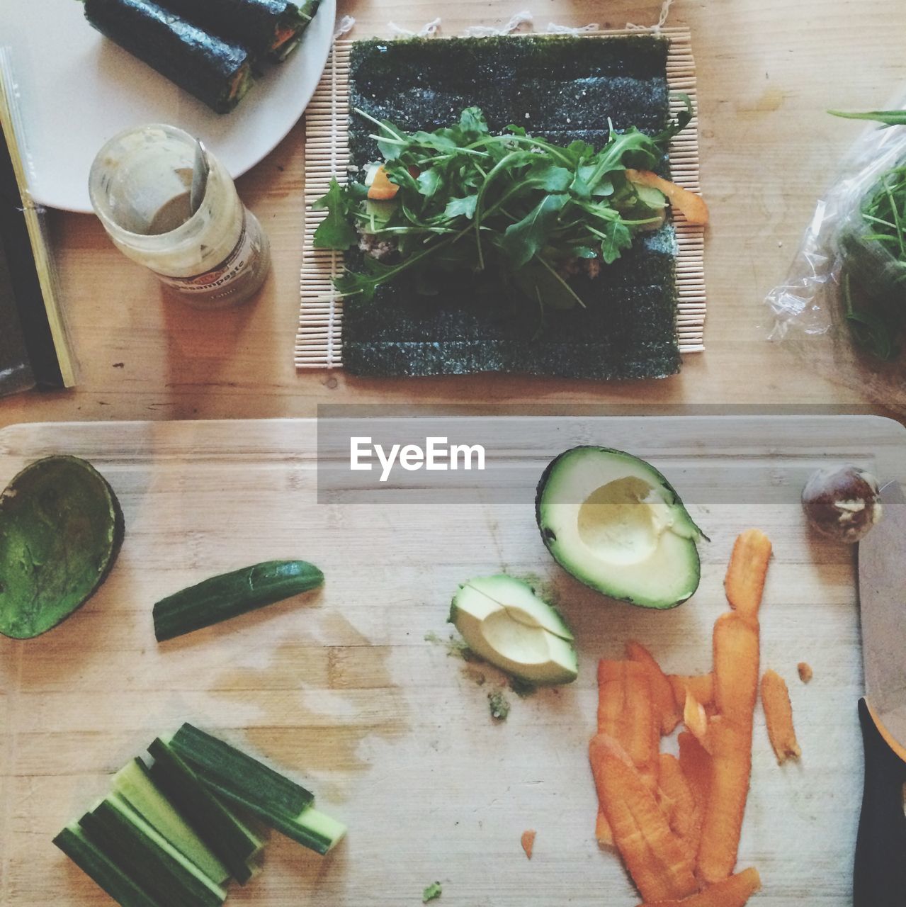 Directly above shot of sliced vegetables on cutting board