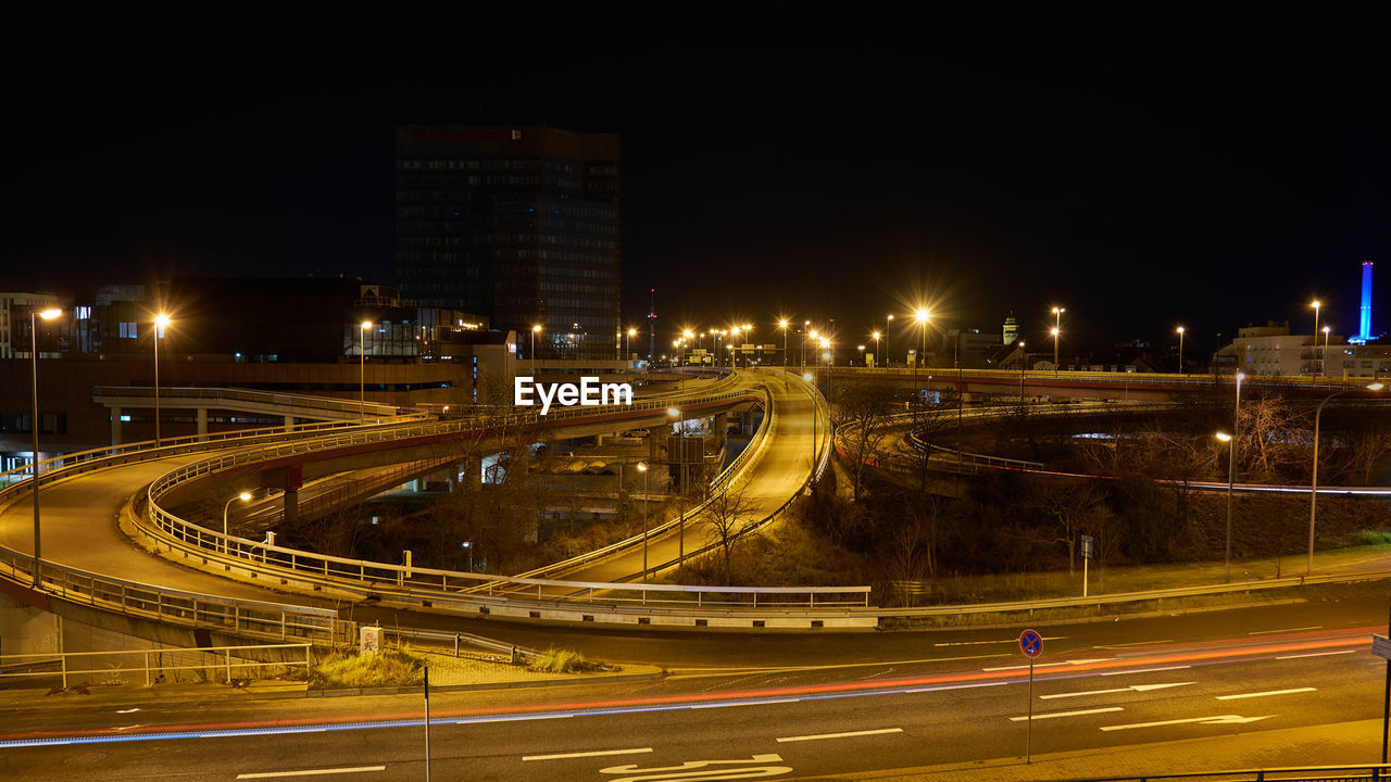 High angle view of light trails on road at night