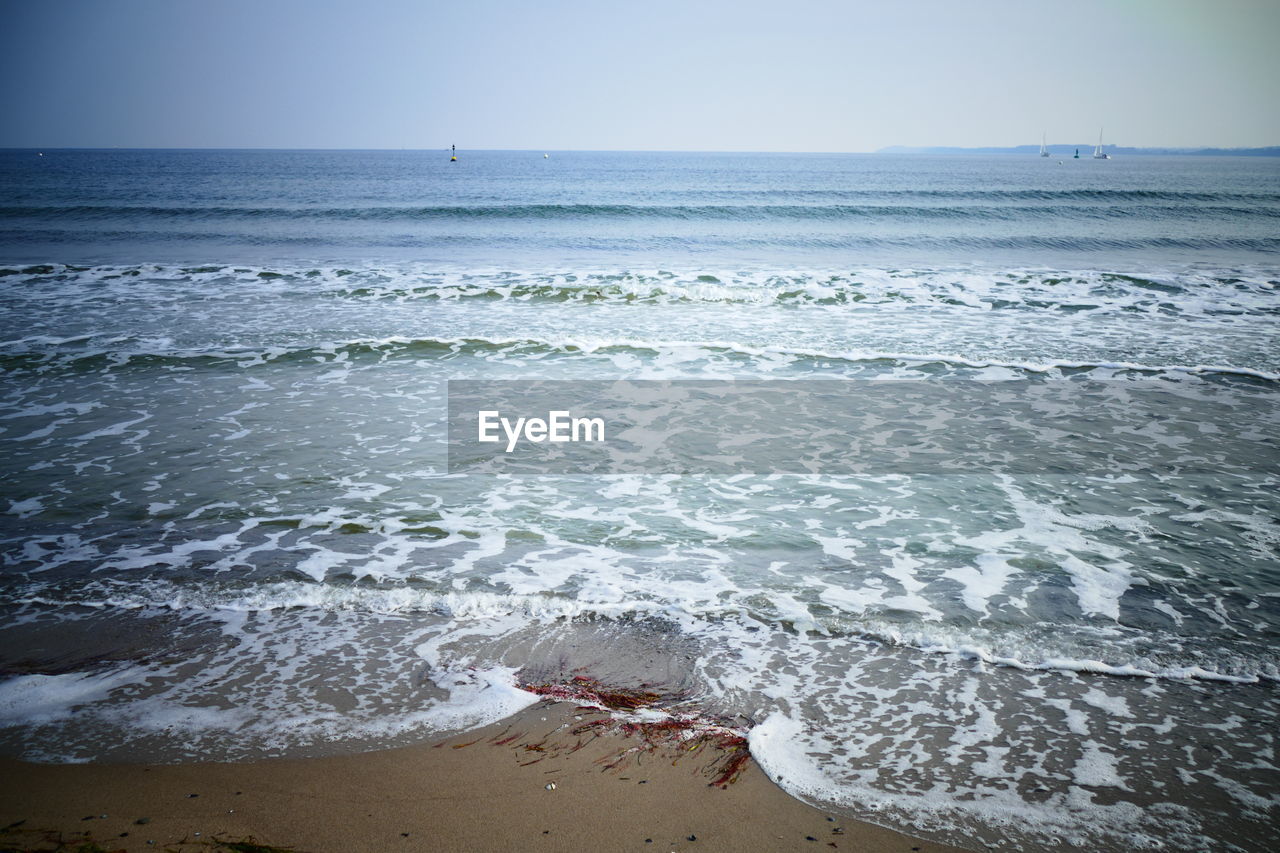 Scenic view of sea against clear sky