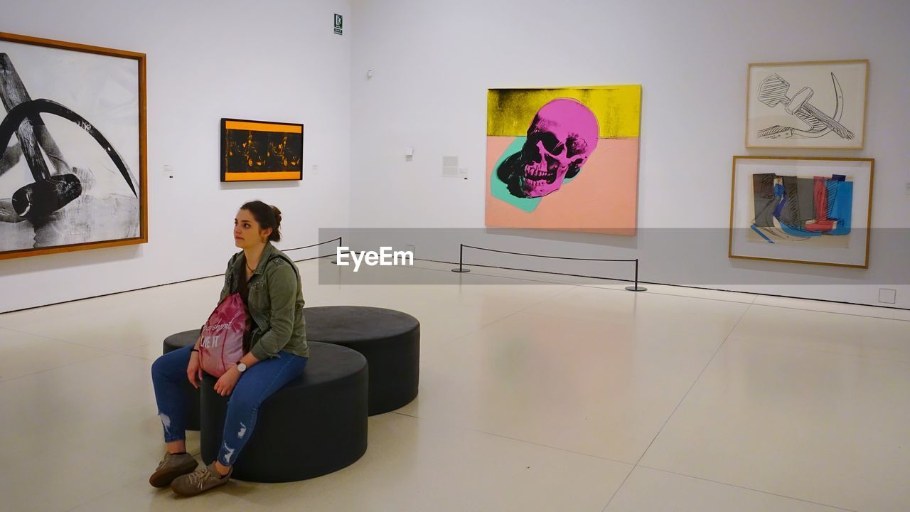 FULL LENGTH OF WOMAN IN MUSEUM