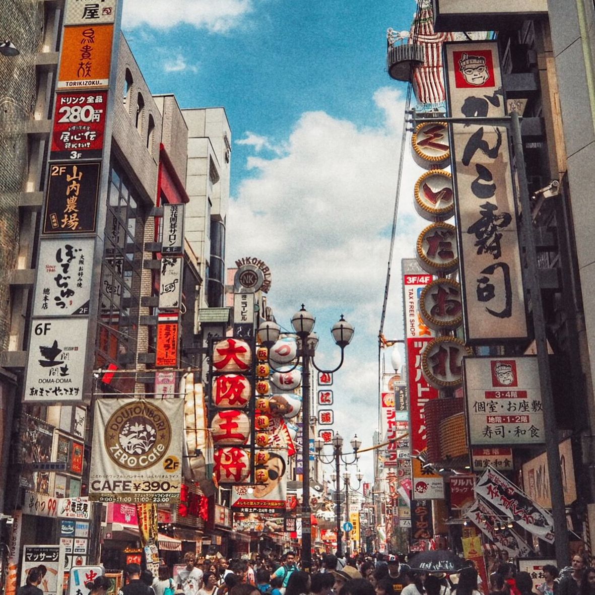 Crowded street amidst buildings