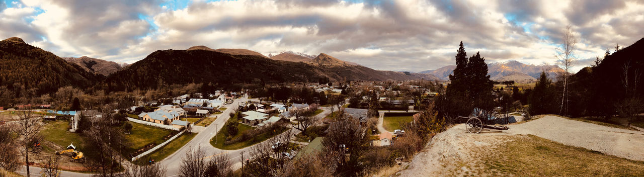 PANORAMIC SHOT OF TOWNSCAPE AGAINST SKY