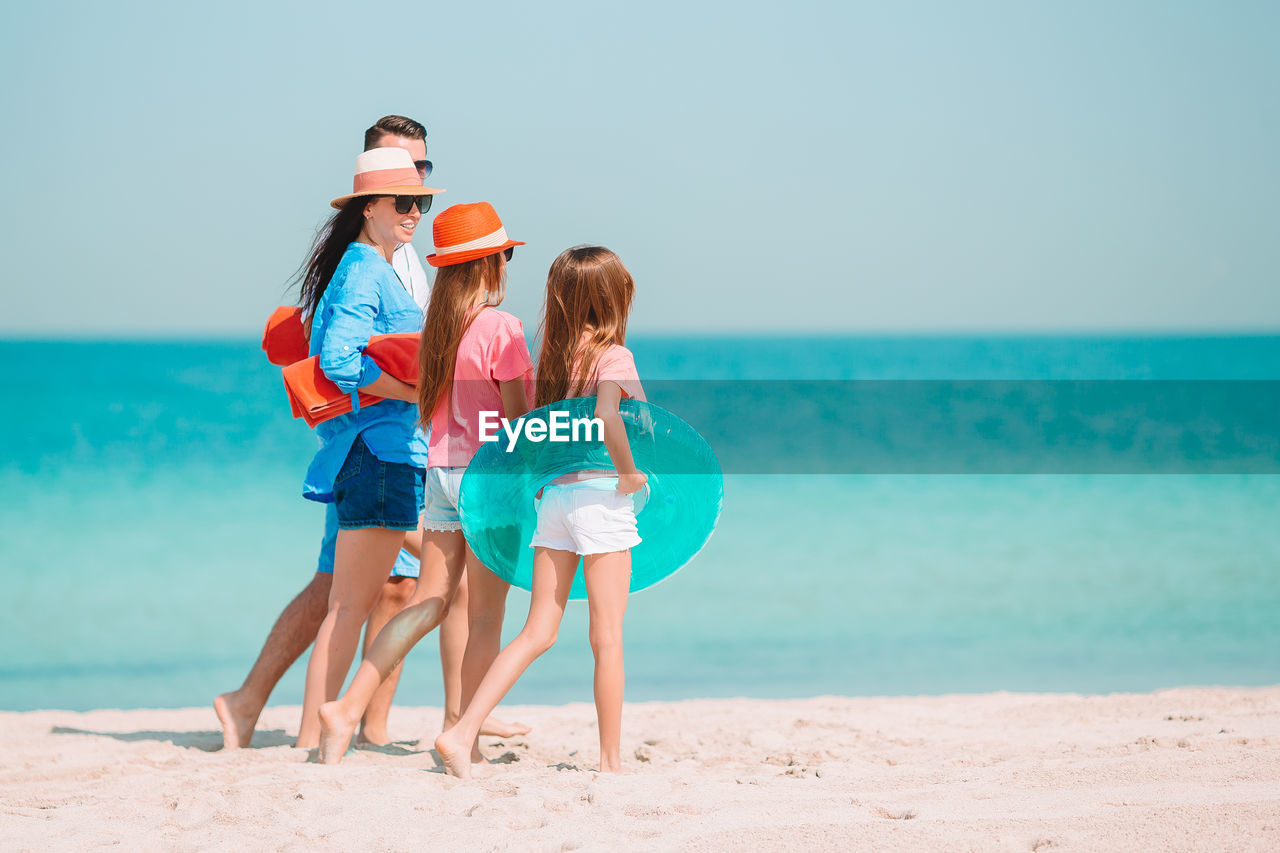 Full length of women on beach