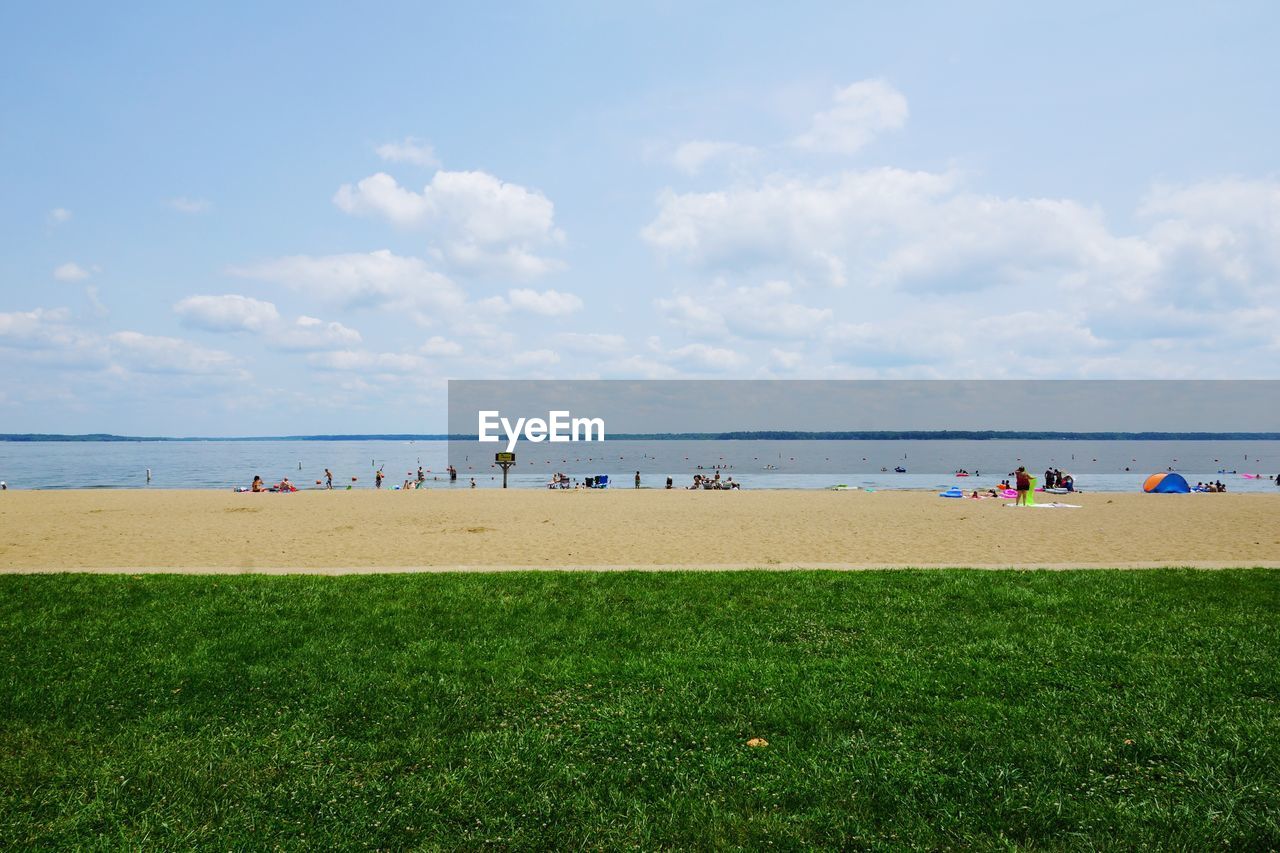 Scenic view of sea against cloudy sky