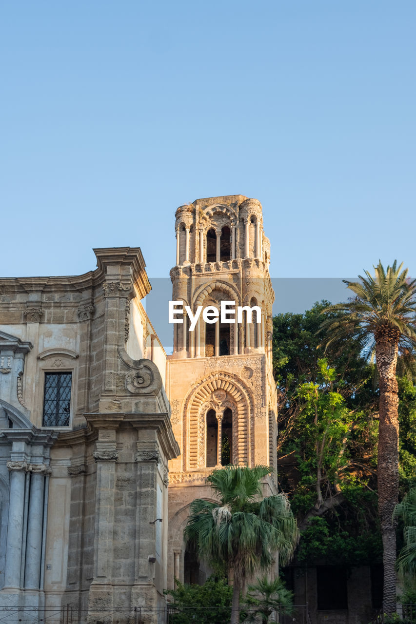 Low angle view of historic building against clear sky