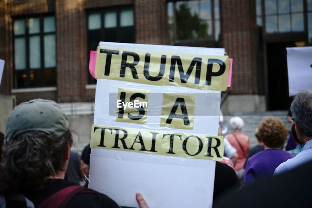 Rear view of trump protest sign