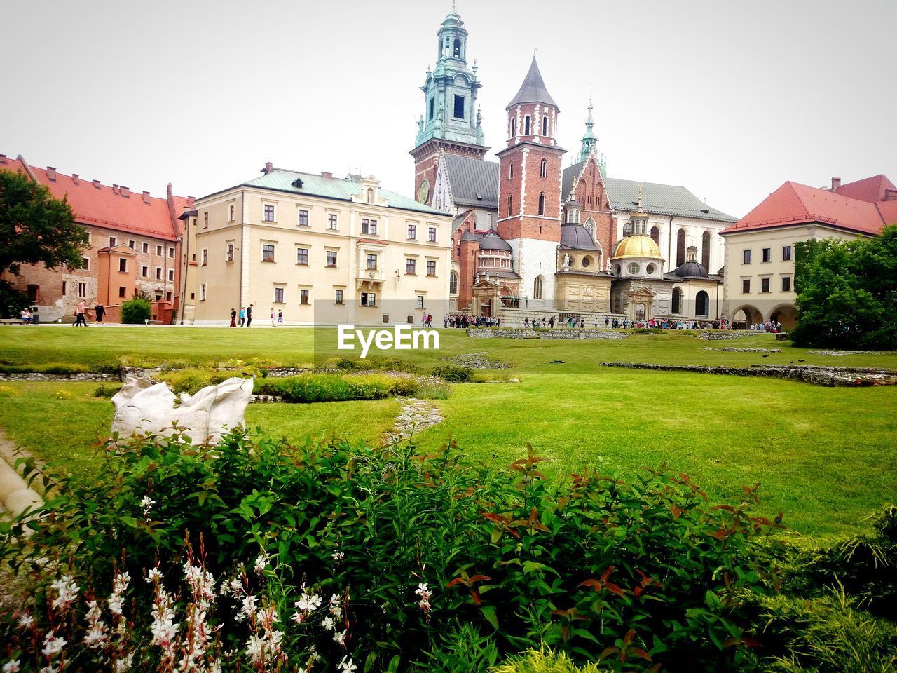 Garden in front of wawel castle and wawel cathedral against clear sky