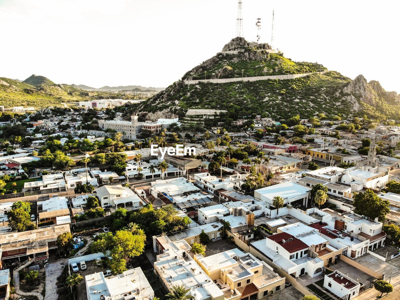 AERIAL VIEW OF BUILDINGS AGAINST SKY