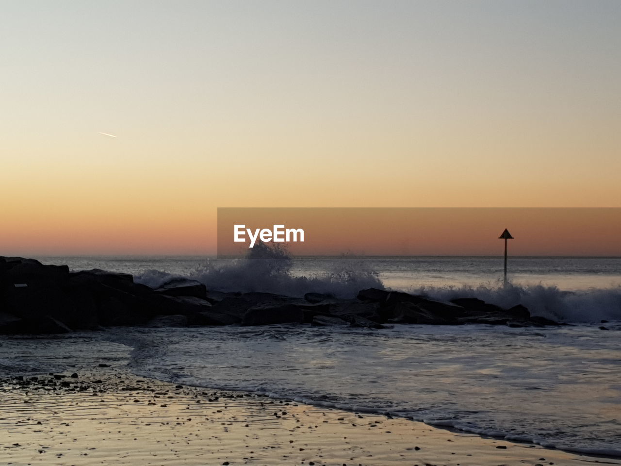 SCENIC VIEW OF SEA DURING SUNSET