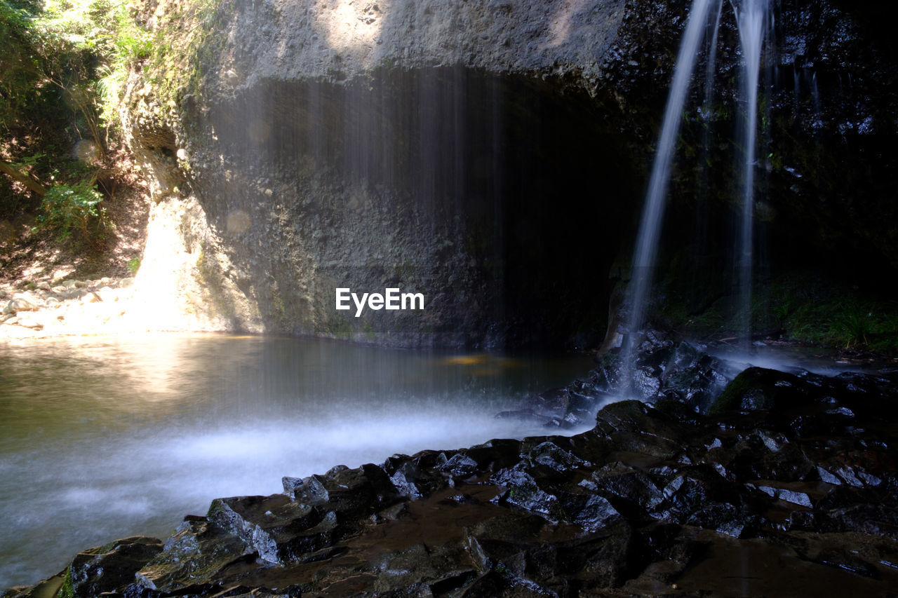 SCENIC VIEW OF WATERFALL